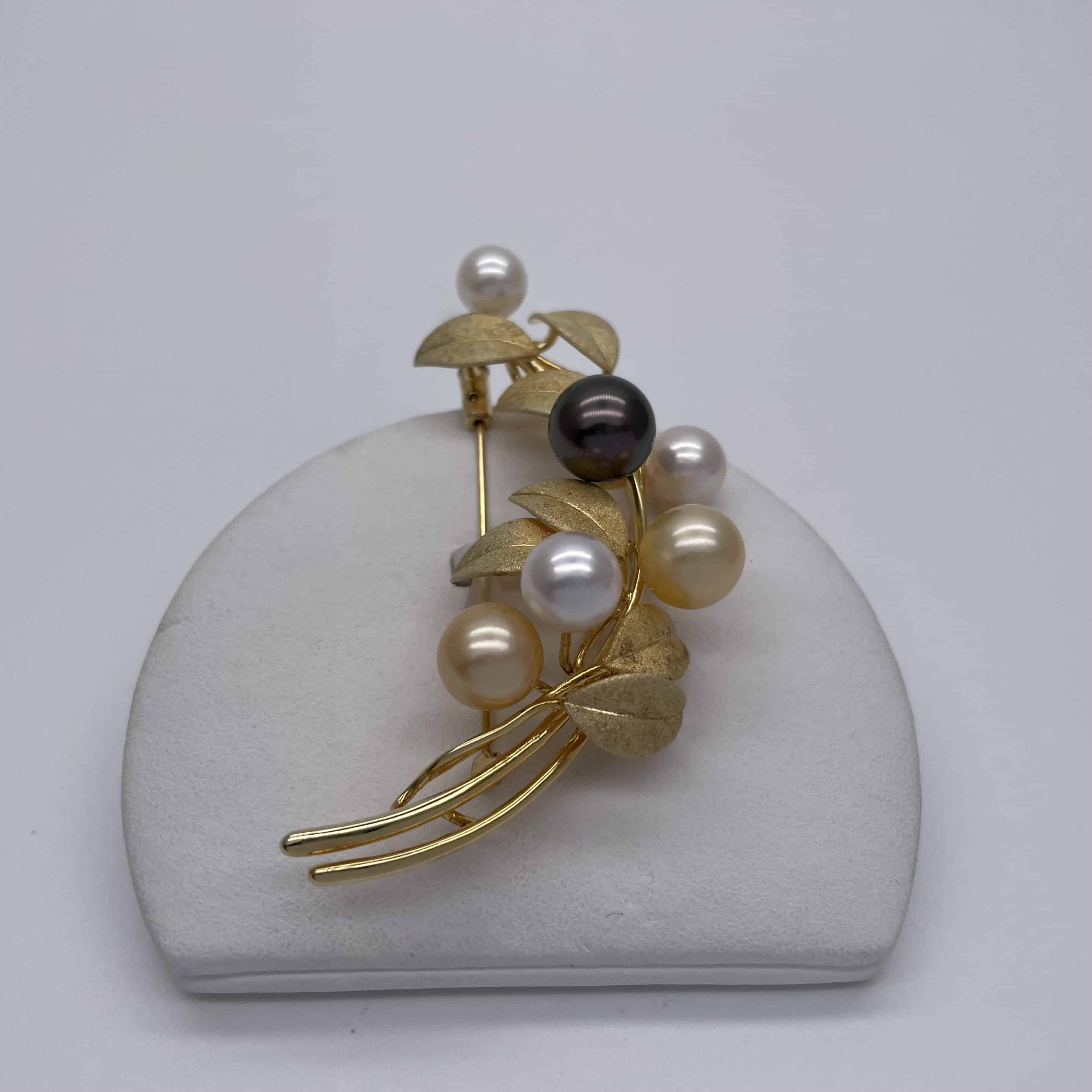 silver and pearl brooch